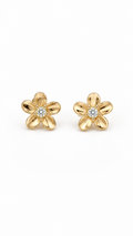 Elegant gold flower stud earrings with five rounded petals and brilliant cubic zirconia centers. Minimalist floral earrings for everyday wear, bridesmaids, weddings, and thoughtful gifts.
