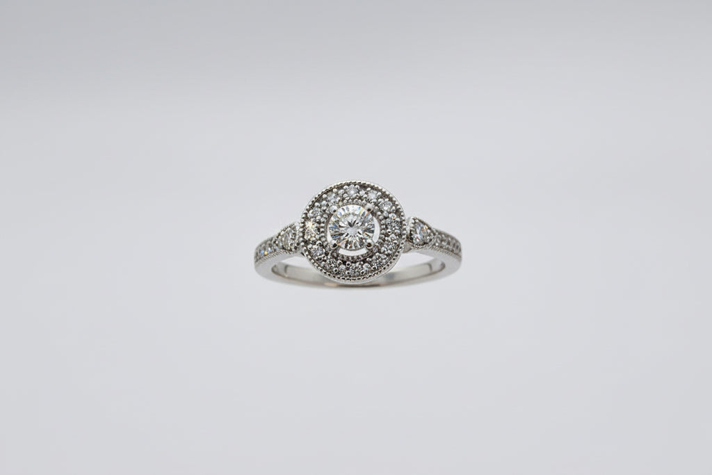 Sterling Silver Round Diamond Accent  (1/20 CTW, Size 7)