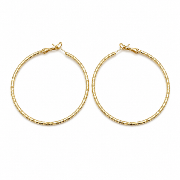 Pair of large gold filled diamond cut hoop earrings on a pure white background. Lightweight textured hoops with secure hinged closure, polished finish, and classic everyday design.