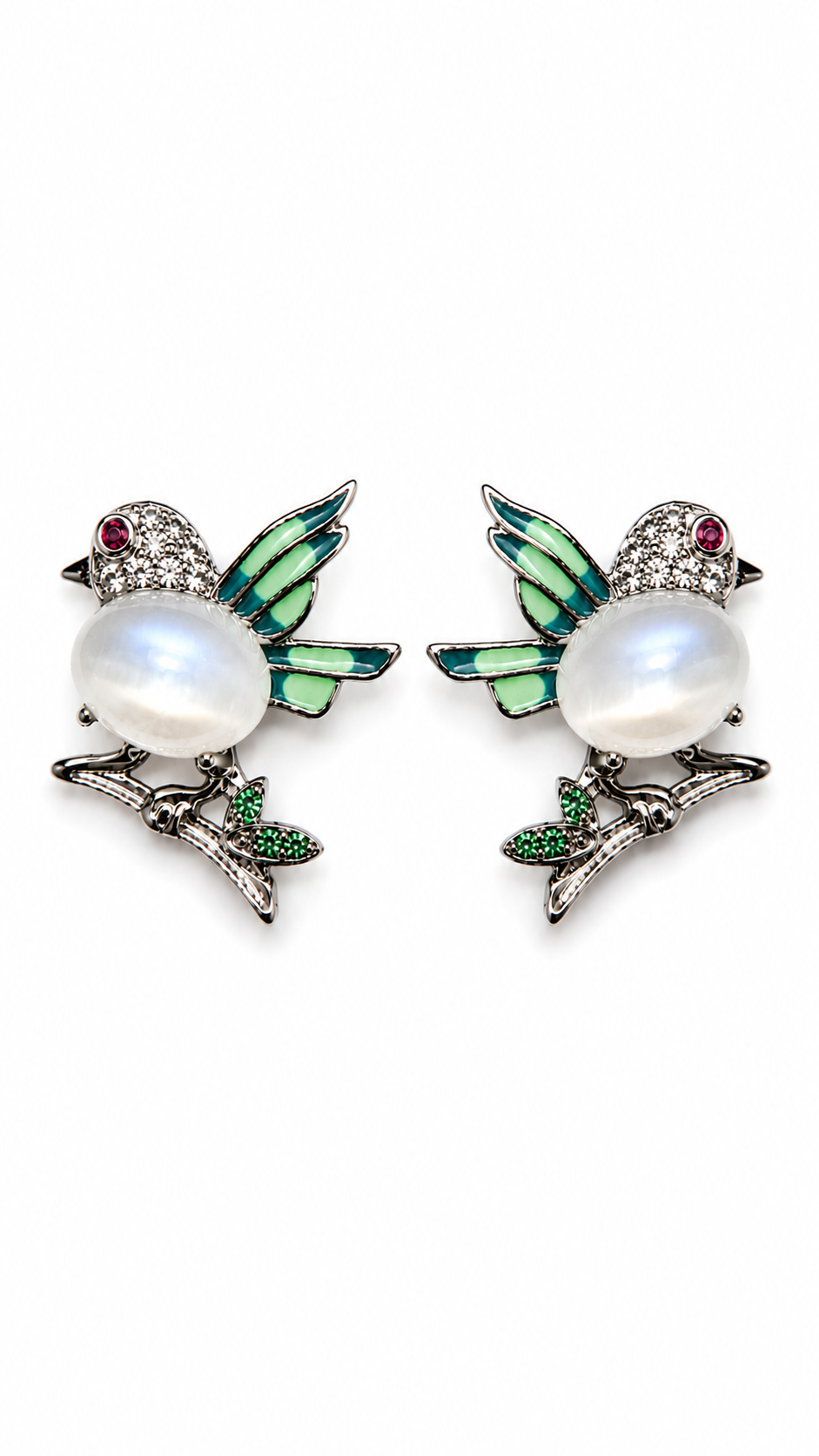 Silver moonstone bird stud earrings with hand-painted mint green enamel wings, cubic zirconia details, and crystal leaf accents, photographed on a white background.