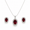 Red oval halo jewelry set featuring a sterling silver curb chain necklace with a sparkling oval red gemstone pendant and matching halo stud earrings on a pure white background.