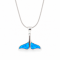 Sterling silver whale tail pendant necklace featuring a vibrant blue synthetic opal inlay on a polished silver snake chain. Elegant ocean-inspired jewelry for everyday wear, beach lovers, and Hawaii-inspired style.