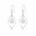 Elegant 925 sterling silver drop earrings featuring a polished silver bead suspended within a modern twisted open frame. Lightweight, timeless, and perfect for everyday wear.