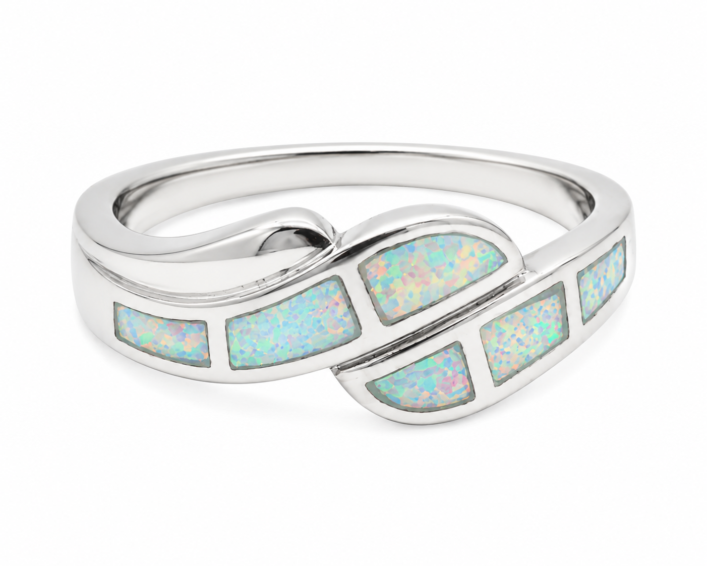 Polished silver wave ring featuring white synthetic opal inlay
