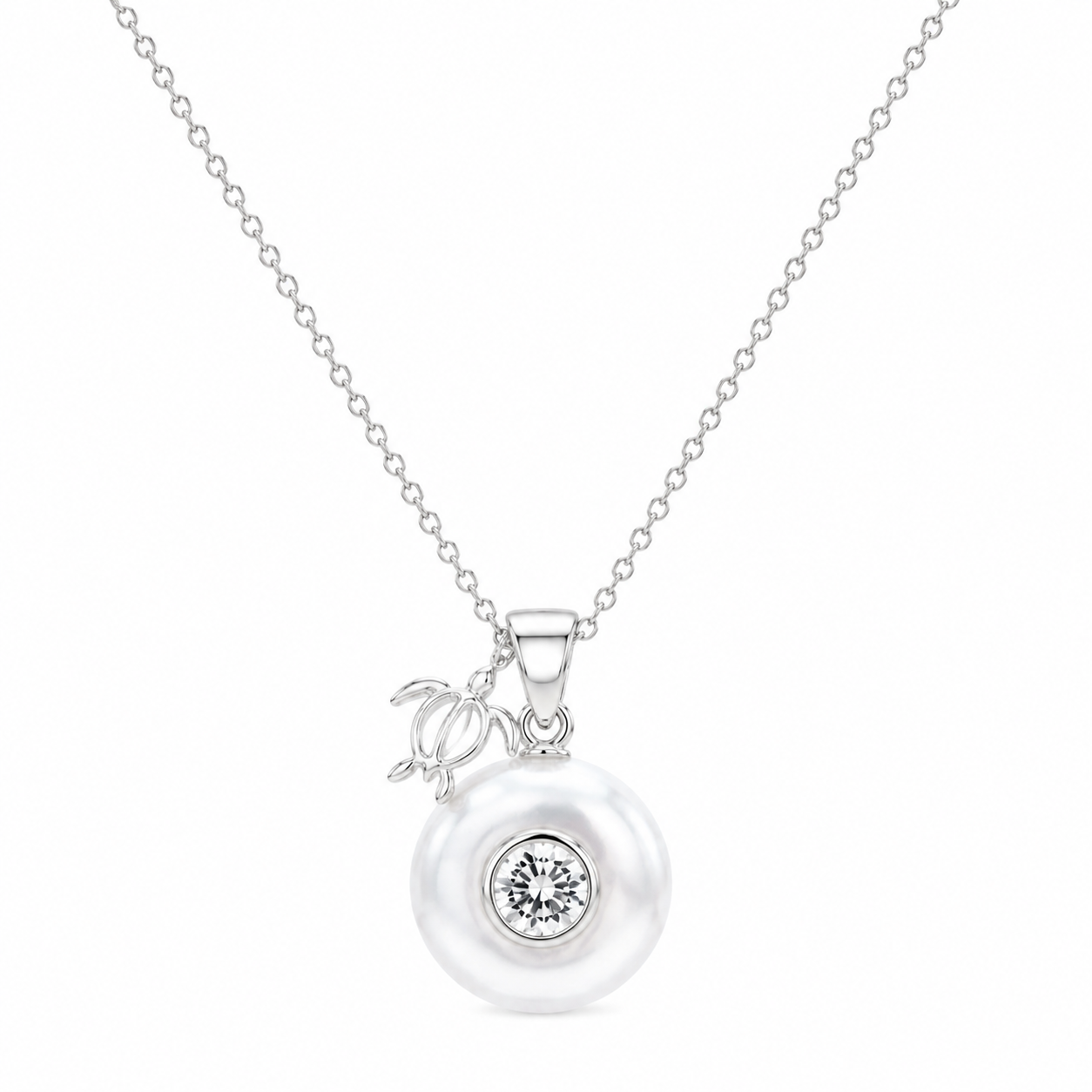 Sterling silver Birthstone Turtle Necklace featuring a genuine pearl and April diamond birthstone.