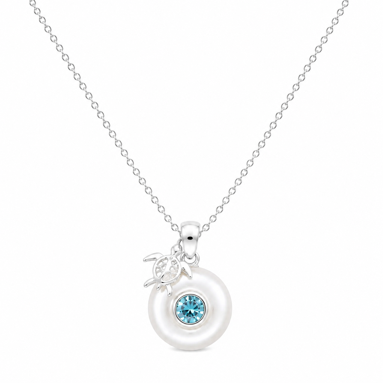 Sterling silver Birthstone Turtle Necklace with genuine pearl and December blue topaz birthstone.
