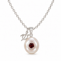 Sterling silver Birthstone Turtle Necklace featuring a genuine pearl and January garnet birthstone with turtle charm.