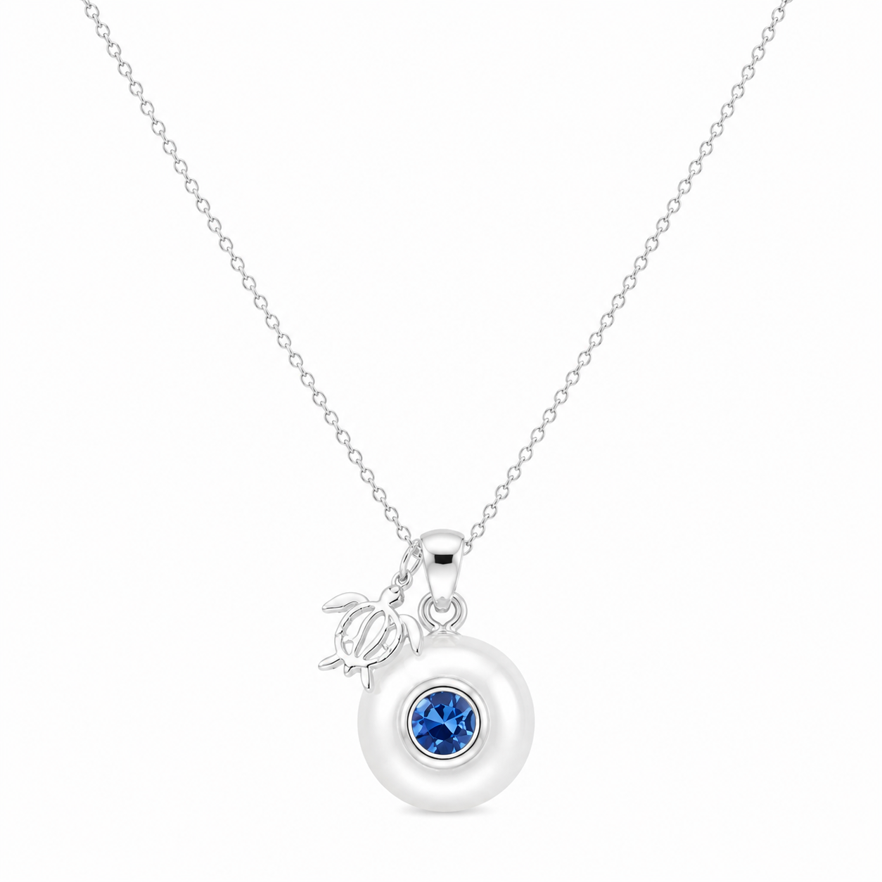 Sterling silver Birthstone Turtle Necklace with genuine pearl and September sapphire birthstone.