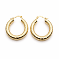 Gold hoop earrings on a white background