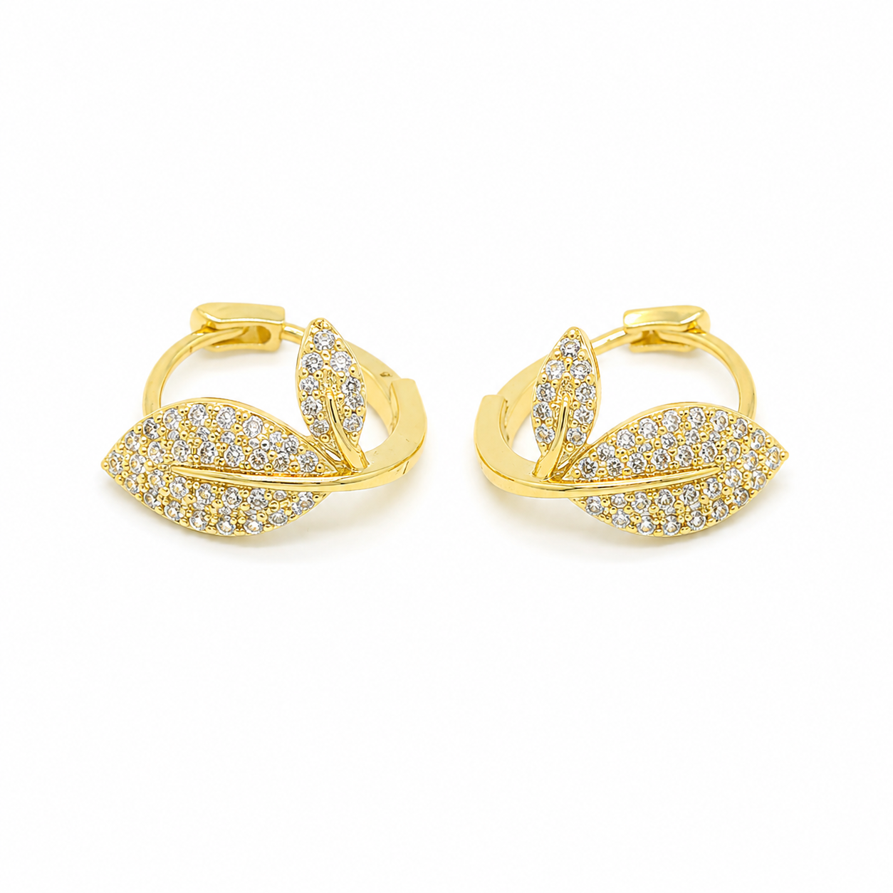 Gold pavé leaf hoop earrings featuring sparkling cubic zirconia stones in a nature-inspired leaf design with secure hinged closures.
