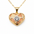 Heart-shaped pendant with gold and rose gold design on a white background