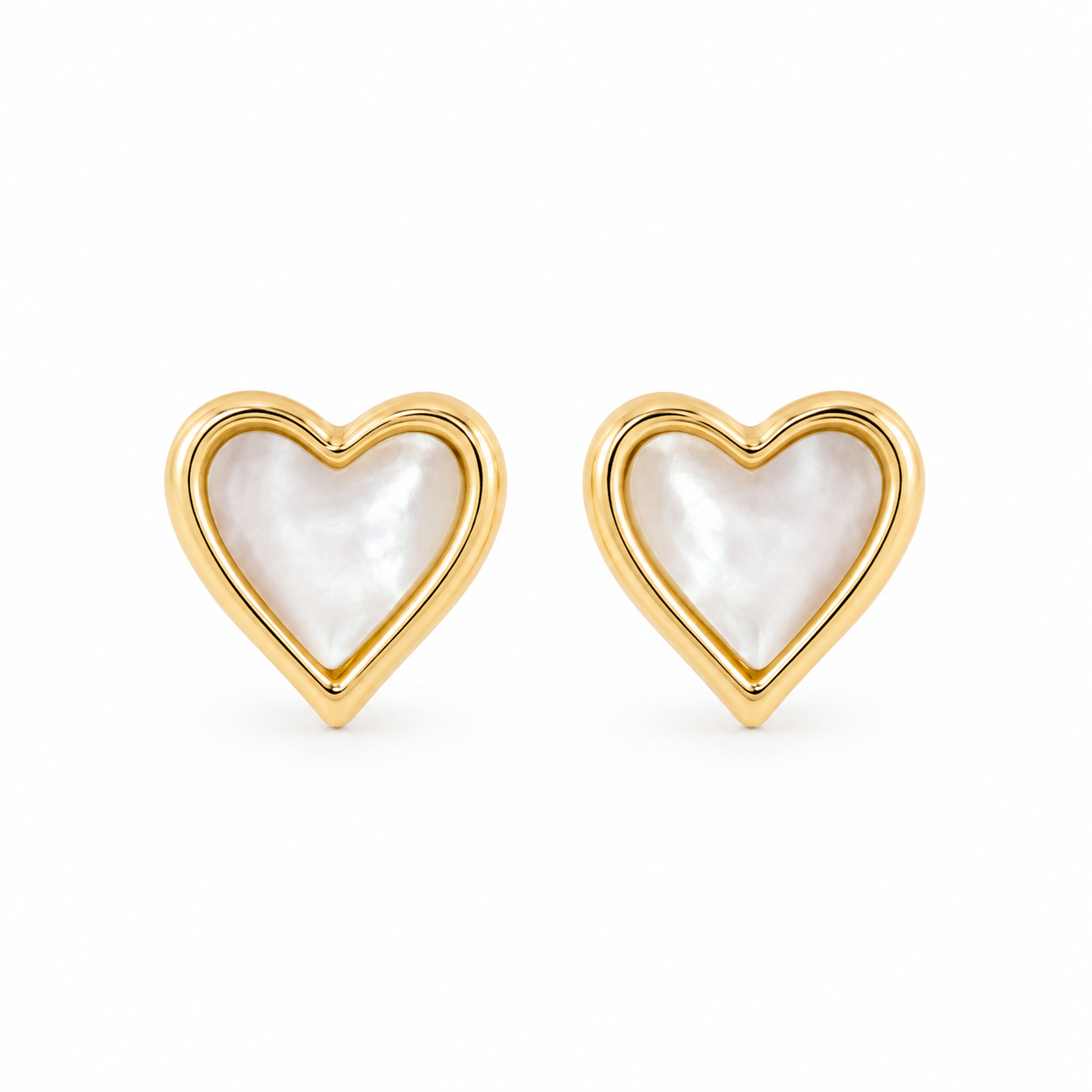 Heart-shaped mother of pearl stud earrings framed in polished gold-plated sterling silver on a clean white background.
