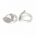 Sterling silver CZ leaf hoop earrings featuring sparkling pavé cubic zirconia leaves and a secure hinged closure.