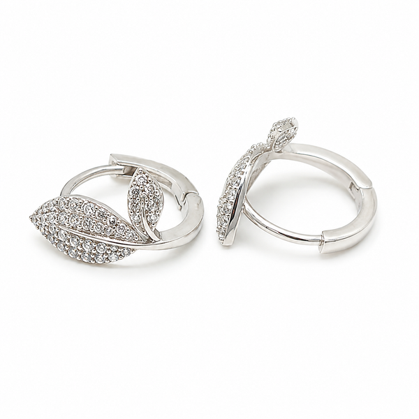 Sterling silver CZ leaf hoop earrings featuring sparkling pavé cubic zirconia leaves and a secure hinged closure.
