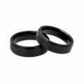 Men’s black satin tungsten ring with brushed finish and polished edges shown