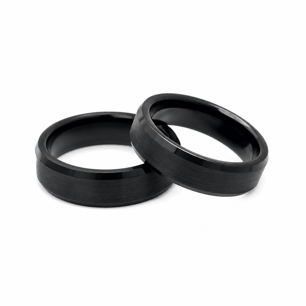 Men’s black satin tungsten ring with brushed finish and polished edges shown