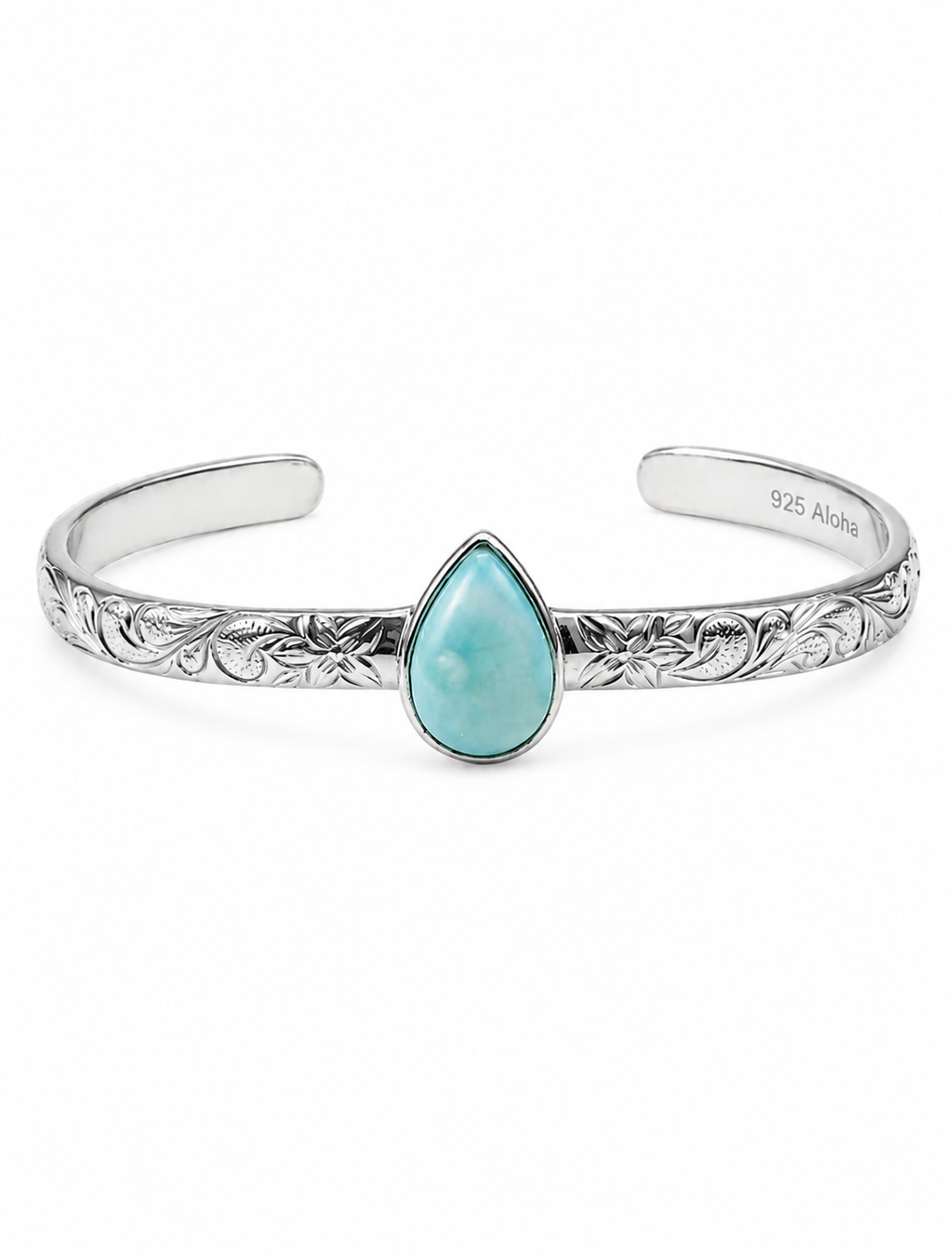 A sterling silver cuff bracelet with an engraved floral pattern and a central teardrop-shaped turquoise stone, shown on a plain white background. The inside of the band is marked '925 Aloha'.