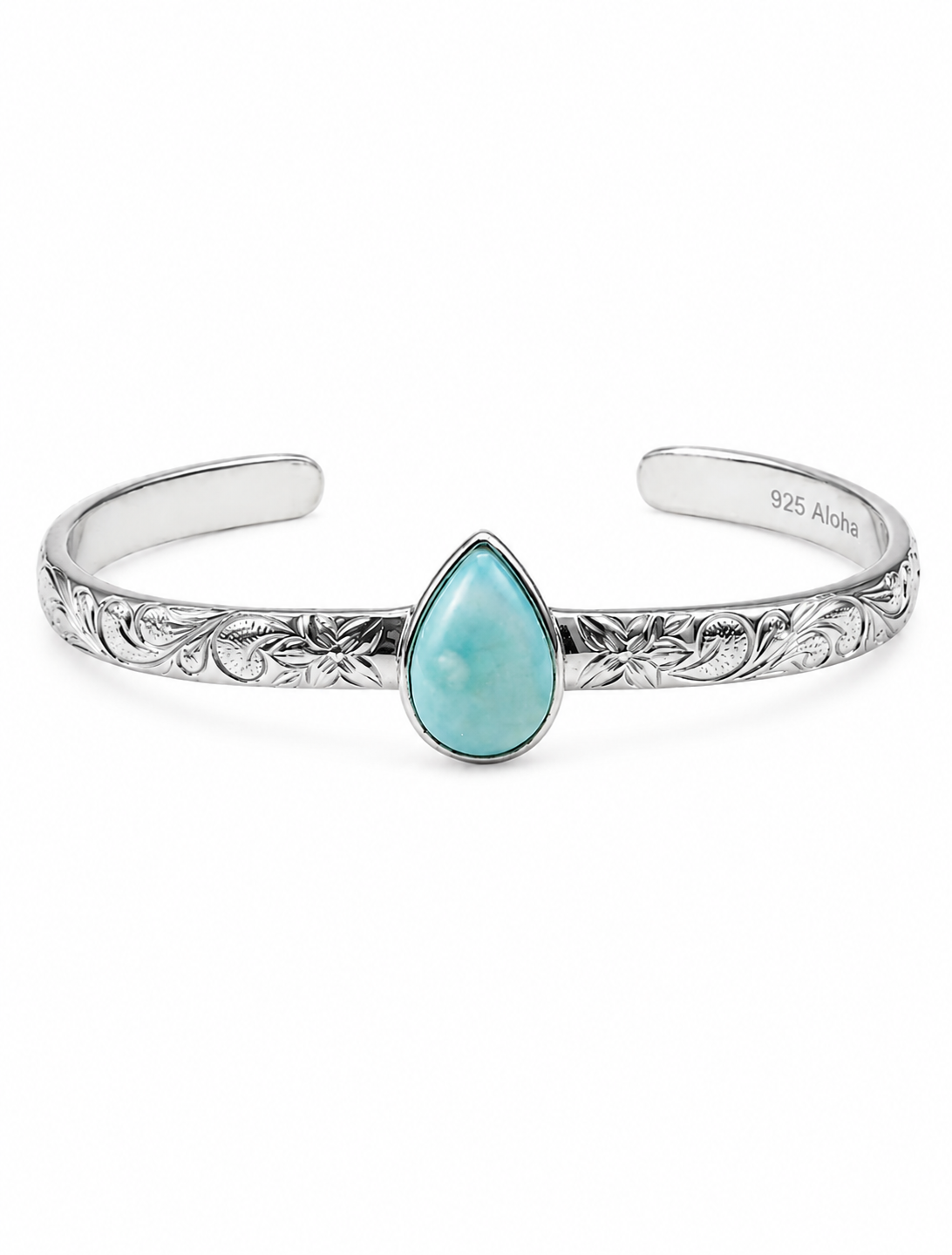 A sterling silver cuff bracelet with an engraved floral pattern and a central teardrop-shaped turquoise stone, shown on a plain white background. The inside of the band is marked '925 Aloha'.